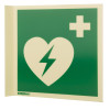Side view of panoramic aed wall sign showing a heart with a lightning bolt and a cross symbol on a green background