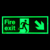 fire exit sign rigid plastic down right size k glowing green on black background in dark
