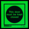 Alt text: Glowing Js5067A Jalite This Door Must Be Kept Closed vinyl sign with black text on a green background
