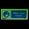 Glowing wash your hands sign landscape showing hands under a tap with water droplets and text reading wash your hands