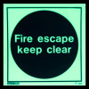 fire escape keep clear sign vinyl with light green glow on black circle background in dark setting