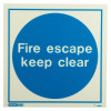 Front of a fire escape keep clear sign showing white text on a blue circle background