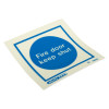 Js5421A Jalite Fire Door Keep Shut Vinyl Sign angled with blue circle and white text on a white background