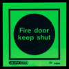 Js5421A Jalite Fire Door Keep Shut Vinyl Sign glowing green with black text and border