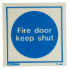 Front view of fire door keep shut sign made of rigid plastic with blue circle and white text