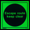 Js5485Er Jalite rigid plastic sign glowing green with black circle and text Escape route keep clear
