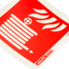 Close up of fire hose id sign square with white hose icon and flames on a red background