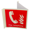 angled fire telephone panoramic sign showing a white handset symbol and flames on a red background with text Fire telephone