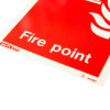 Closeup of the Js6459Dr Jalite Fire Point Sign showing the text fire point on a red background