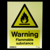 Glowing warning flammable substance sign with black flame symbol on yellow triangular background