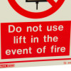 Closeup of lift prohibited sign 200x150mm with text Do not use lift in the event of fire in red and white colors