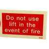 Closeup of a lift prohibited sign with red background and white text stating do not use lift in the event of fire