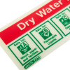 Close up of dry water mist self adhesive sticker showing safety icons and text in red and green on white background