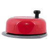 side view of a red jewel rotary hand bell with a black knob on a grey base
