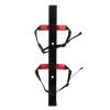 Heavy duty extinguisher transport bracket made of black metal with red padded grips and adjustable black straps