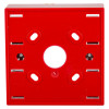 A rear view of a red surface‑mounting call point back box, featuring several elongated mounting slots and a central circular cutout.