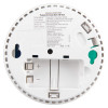 Back view of a smoke alarm showing the open battery compartment and product information label