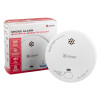 Smoke alarm shown outside and inside its retail packaging with brand and instructions visible