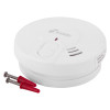 Kidde battery optical smoke alarm with two screws and wall plugs shown against white background
