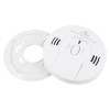 kidde combination smoke carbon monoxide alarm shown with backing plate on a white background