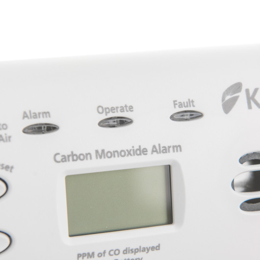 Closeup of indicators on the Kidde co digital alarm showing Alarm, Operate and Fault labels above a digital display