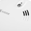 A close-up of a Kidde smoke alarm showing the logo, LED indicator, test button and three curved vent slots.