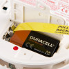 kidde firex mains powered heat alarm showing alkaline battery backup with pull out tab in place