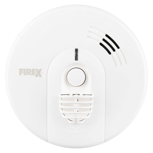 Front view of Kidde Firex mains powered heat alarm with alkaline battery backup showing circular white casing and central button
