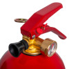 Close-up of the nozzle and handle of a kidde 2kg powder extinguisher showing the pressure gauge and safety pin