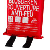 A red fire blanket pouch labelled in multiple languages with three illustrated usage steps and black pull tapes at the bottom; size 1m x 1m, model KFB1010