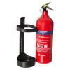 A red 2kg ABC powder fire extinguisher with a pressure gauge and yellow safety pin, placed beside a black mounting bracket