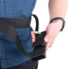 Person wearing modum and saffold harness holding ladder attachment piece