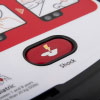 A close-up of the shock button of a defibrillator