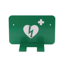 a front view of a green metal bracket to hang a defibrillator with a white heat with green lightening logo to denote a defib there is a white cross on the right of the heart to denote a piece of first aid equipment