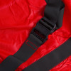 Close-up of black buckle and strap on a red mip emergency evacuation sheet