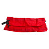 Red mip emergency evacuation sheet unrolled showing fabric texture and straps on white background