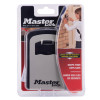 master lock 5401 key safe shown in original packaging with product details and image of a person using the lock