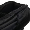 a close up of the pockets inside the black bag