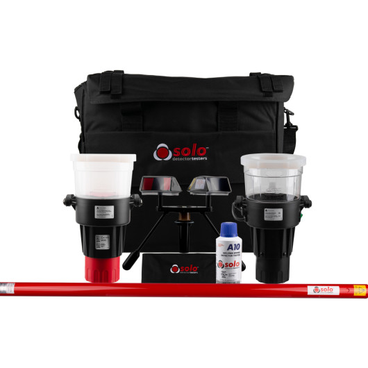 Components of the solo 814 smoke heat detector test removal kit solo424 heat dispenser arranged with a black carry bag behind