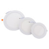 Three round recessed LED emergency downlights obmel12m obmel18m shown in a group from largest to smallest size
