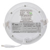 round recessed emergency downlight meled showing the back with labels, screws, and a connecting cable attached