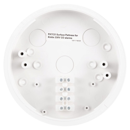 A white circular surface pattress for Kidde 230V alarms, with multiple screw holes and connection points, and an internal printed label displaying product details.