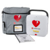 physio control lifepak cr2 trainer unit showing the main device, a grey carry case with heart logo, and an instruction manual