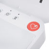 A close-up of the red shock button