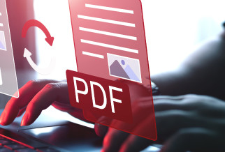 Hands typing on a laptop keyboard with a digital overlay of a Pdf Download document icon