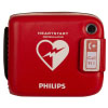 A red defibrillator storage case with a white and red heart logo