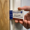 Fire Door Gap Gauge Being Used on a Fire Door