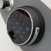 Close-up of the fingerprint lock on the phoenix data commander 4621 safe with illuminated keypad and open button