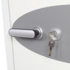 phoenix data commander 4621 safe showing a key inserted into the lock next to a handle on a grey and white surface