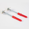 phoenix titan 1281 safe floor fixing bolts with red plastic anchors and metal washers shown on a plain background